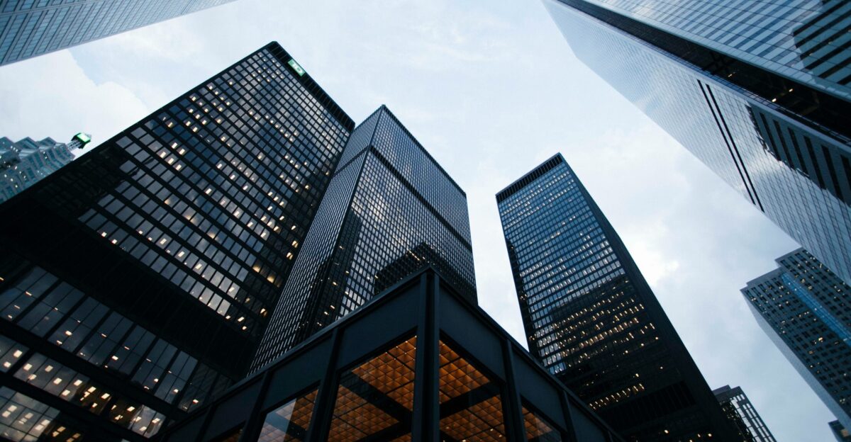 low angle photo of city high rise buildings during daytime