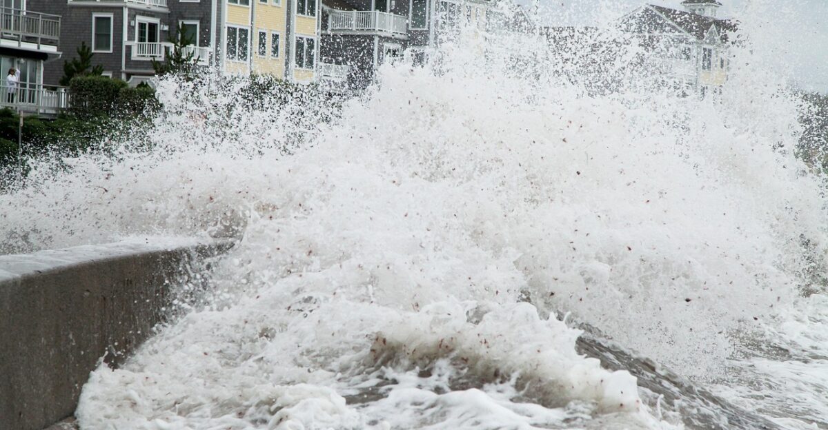 storm surge breech hurricane violent weather nature storm danger flooding ocean high tide debris new england rhode island narragansett beach town disaster gray beach gray news gray ocean gray storm gray island gray new