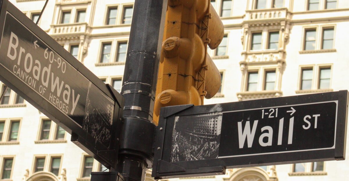 Broadway and Wall St sign in 2025