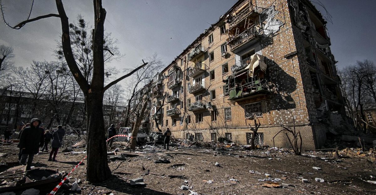 A war-torn residential building in Kyiv Ukraine showing significant destruction and debris