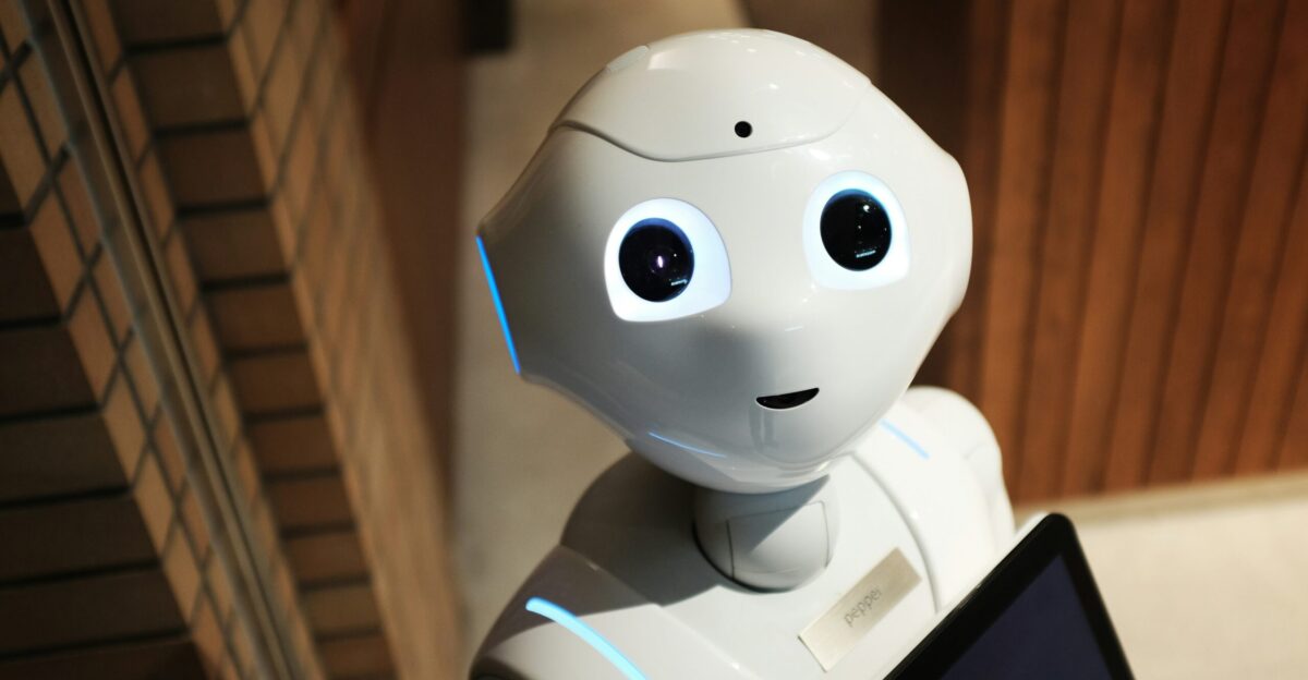 white robot near brown wall