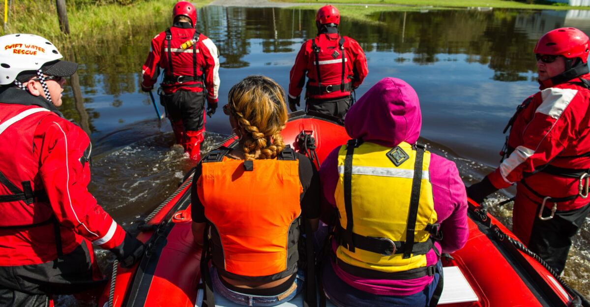 A team of swift water rescue firefighters from Columbia Tenn help transport residents of Brown s Ferry Georgetown S C to retrieve possessions from their flooded homes Oct 11 2015 The South Carolina National Guard has been activated to support state and county emergency management agencies and local first responders as historic flooding impacts counties statewide Currently more than 3 000 South Carolina National Guard members have been activated in response to the floods U S Air National Guard photo by Tech Sgt Jorge Intriago Released Unit South Carolina National Guard DVIDS Tags flooding DSCA South Carolina Army National Guard SC National Guard first responder National Guard domestic operations flood response S C Army National Guard SCARNG Defense Support of Civil Authorities DOMOPS SCNG hurricane 2011 SC-HART SCEMD SC Emergency Management Division Hurricane Joaquin SC flood Soldier sctweets scnews nationalguard scwx scflood Happeningnow SCNationalGuard sc flood 2015 joaquin prep sc flood2015